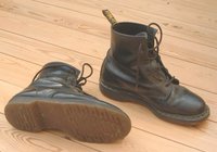A pair of "classic" black leather Dr. Martens.